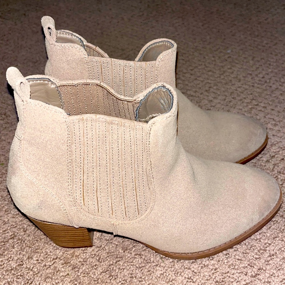 Never worn due to heel being too high.